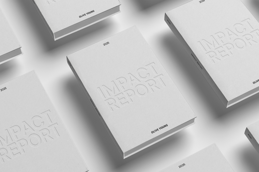 Several white 2025 books labeled “IMPACT REPORT” and “OLIVE YOUNG”.