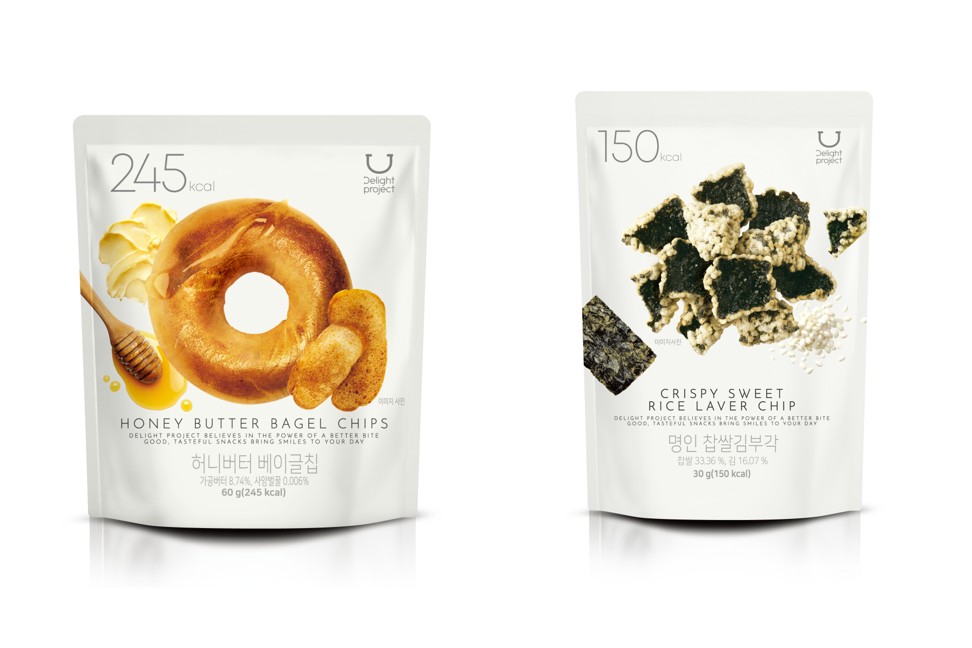 Two snack bags show honey butter bagel chips and crispy sweet rice laver chips.