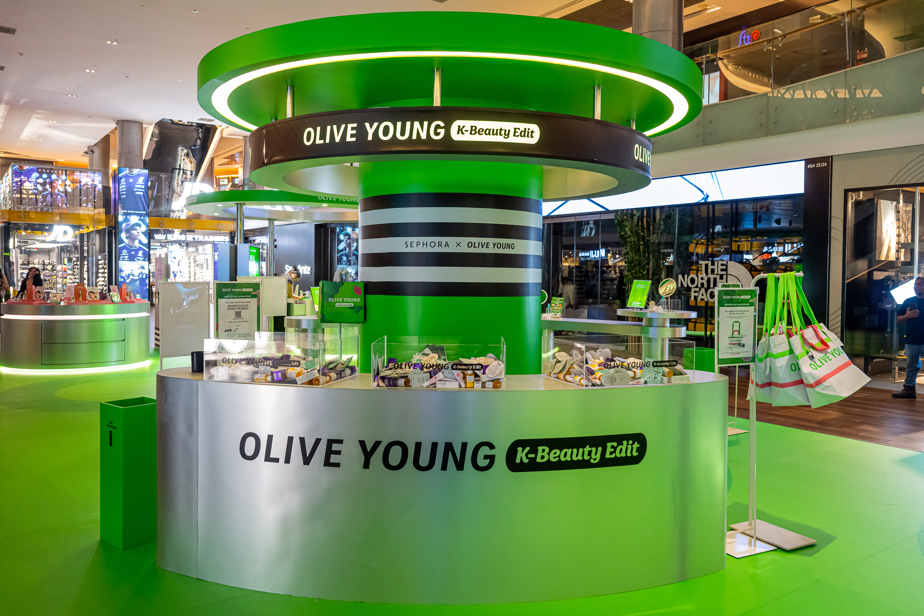 View of the Olive Young K-Beauty Edit pop-up in a shopping mall.