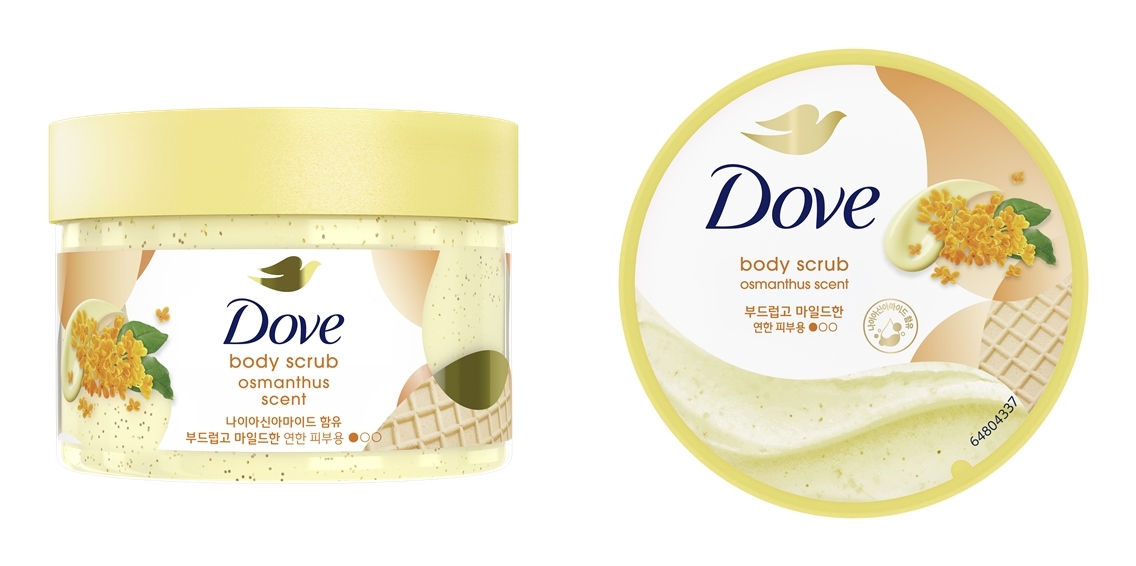 A jar and lid of Dove body scrub labeled “osmanthus scent"